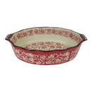 Decorative ceramic baking dish with red floral pattern on a white background