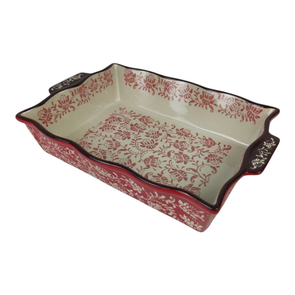 Rectangular ceramic dish with red floral pattern on a white background