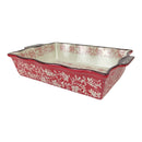 Rectangular ceramic baking dish with red floral pattern on a white background