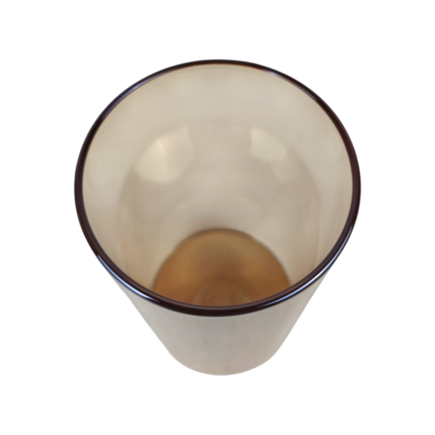 Clear glass tumbler with brown rim on a white background