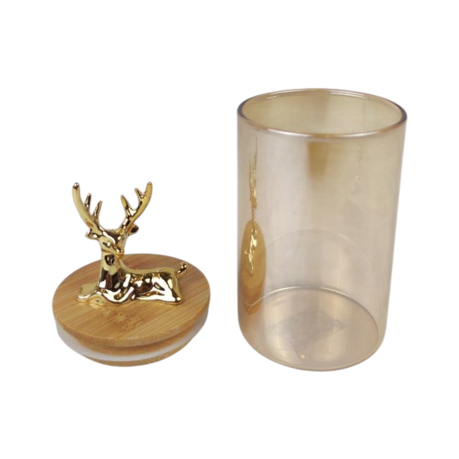 Decorative glass container with gold deer figure on a white background