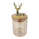 Clear glass jar with a gold deer-shaped lid on a white background