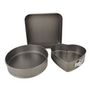 Set of three metal baking pans on a white background