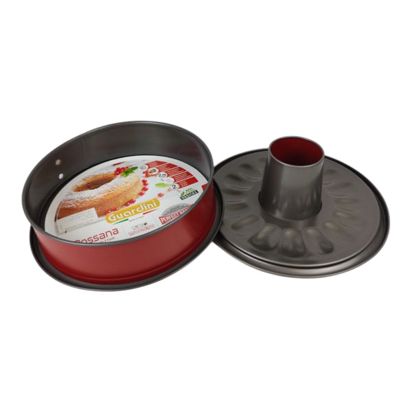 Two cake pans on a white background, one round and one bundt shape.