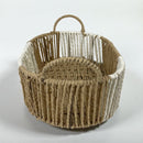 Woven basket with a handle on a white background
