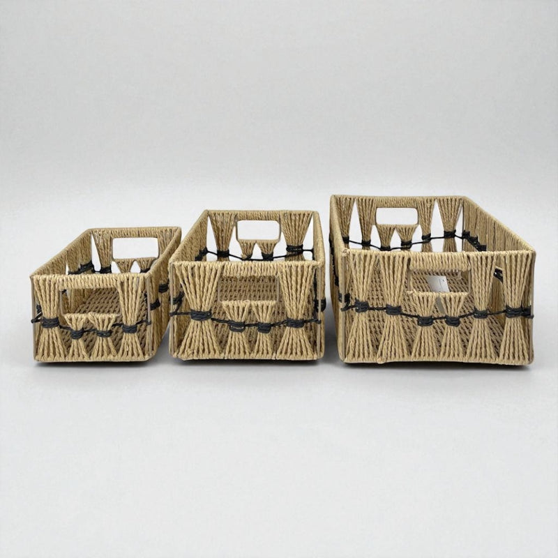 Three woven baskets of different sizes on a white background