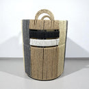 Woven basket with handles on a white background