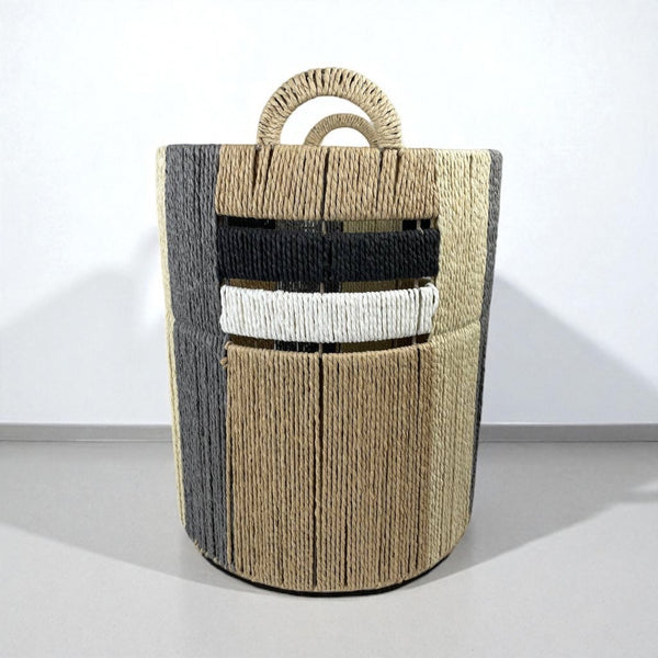 Woven basket with handles on a white background