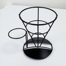 Black metal flower pot stand on a white background