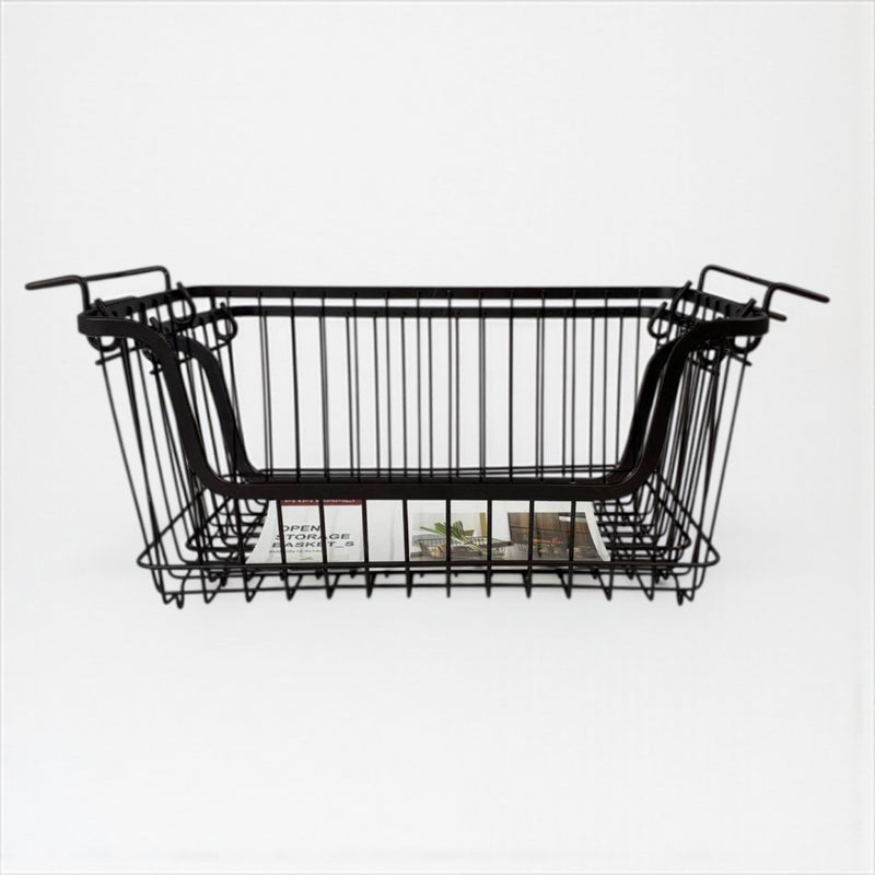 Black wire basket on a white background