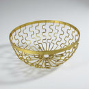 Gold wire basket on a white background