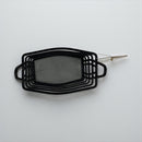 Black hair clip with mesh design on a light gray background