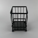 Black metal cart on a gray background