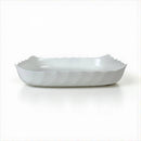 White ceramic dish on a white background