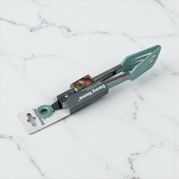 Teal kitchen spatula set on a marble surface with 'Every Home' branding available at cupindy.com