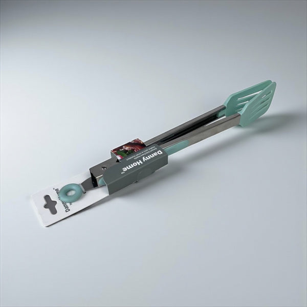 Multifunctional kitchen tool with green handle and black body on a light gray background available at cupindy.com