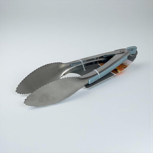 Metal tongs on a light gray background available at cupindy.com