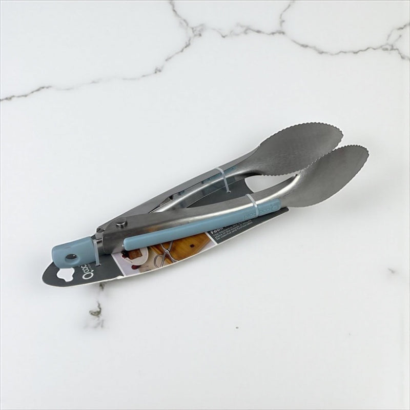 Set of metal utensils on a white marble surface available at cupindy.com