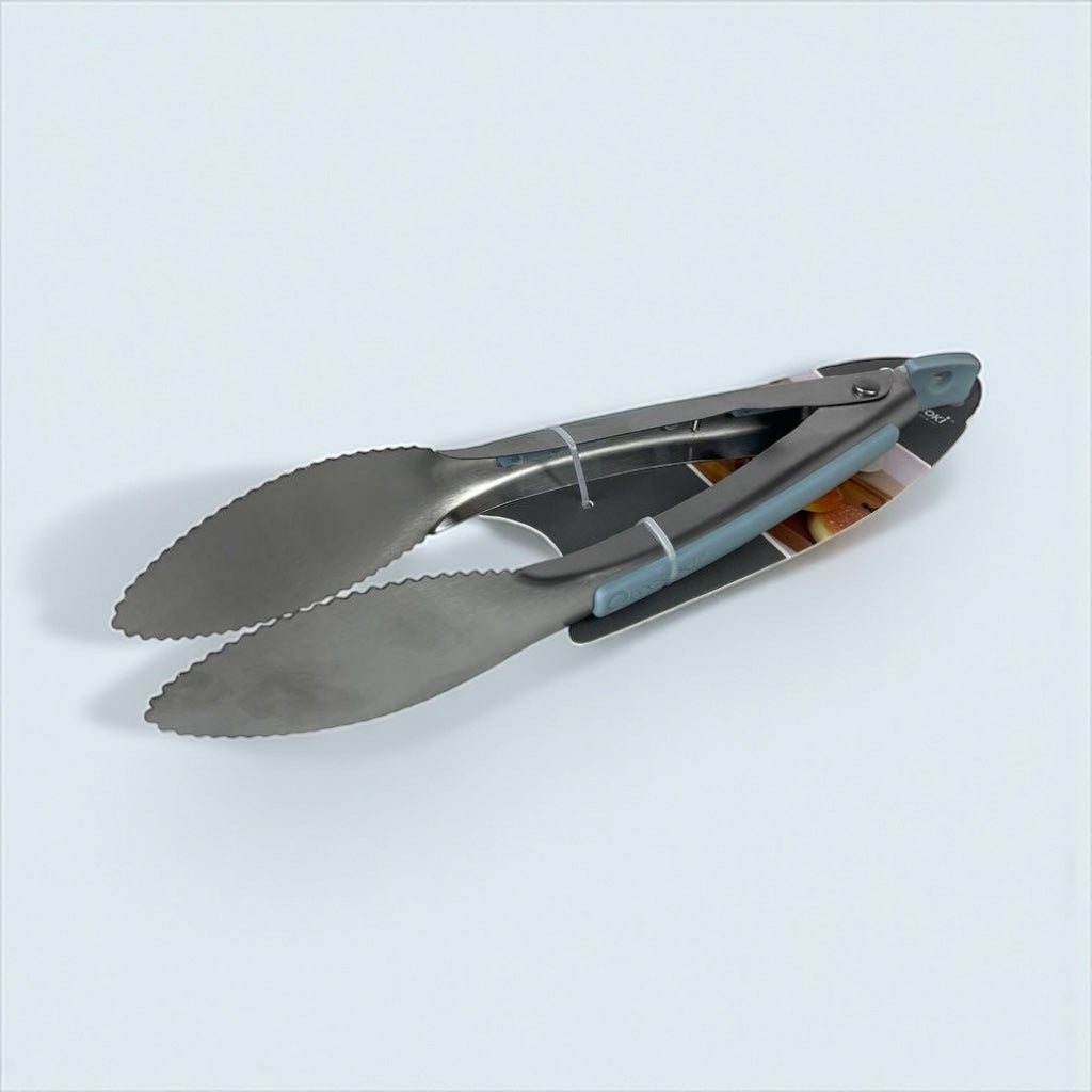 Metal tongs on a light blue background available at cupindy.com