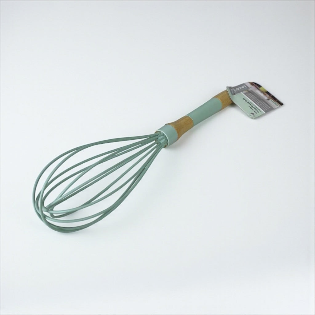 Green whisk with a brown handle on a white background available at cupindy.com