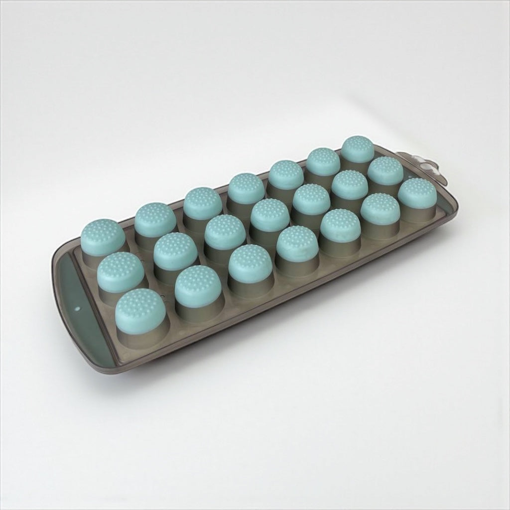 Silicone mold with round cavities on a white background available at cupindy.com