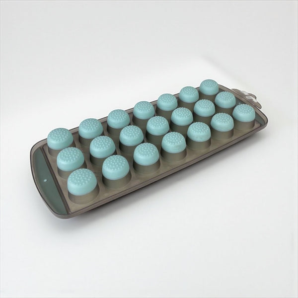 Silicone mold with round cavities on a white background available at cupindy.com