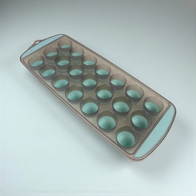 Mold with multiple small round cavities on a light gray background available at cupindy.com
