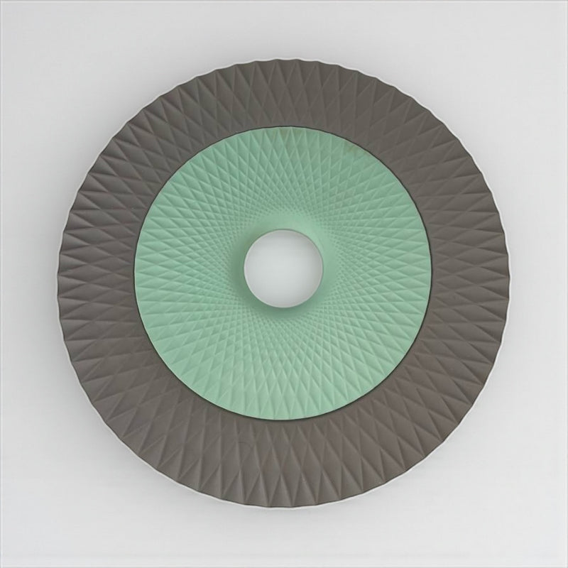 Decorative wall light fixture with green center and gray outer rim on a white background available at cupindy.com