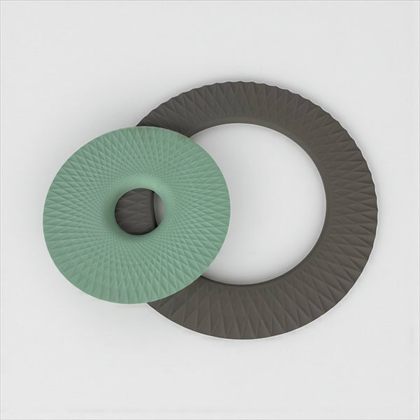 Two circular rubber buffers, one green and one brown, on a white background available at cupindy.com