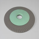 Disc with green center and gray rim on a light gray background available at cupindy.com