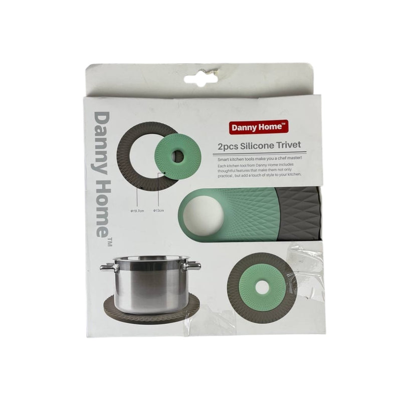 Packaging of Danny Home silicone trivets with a silver pot and green trivets on a white background available at cupindy.com