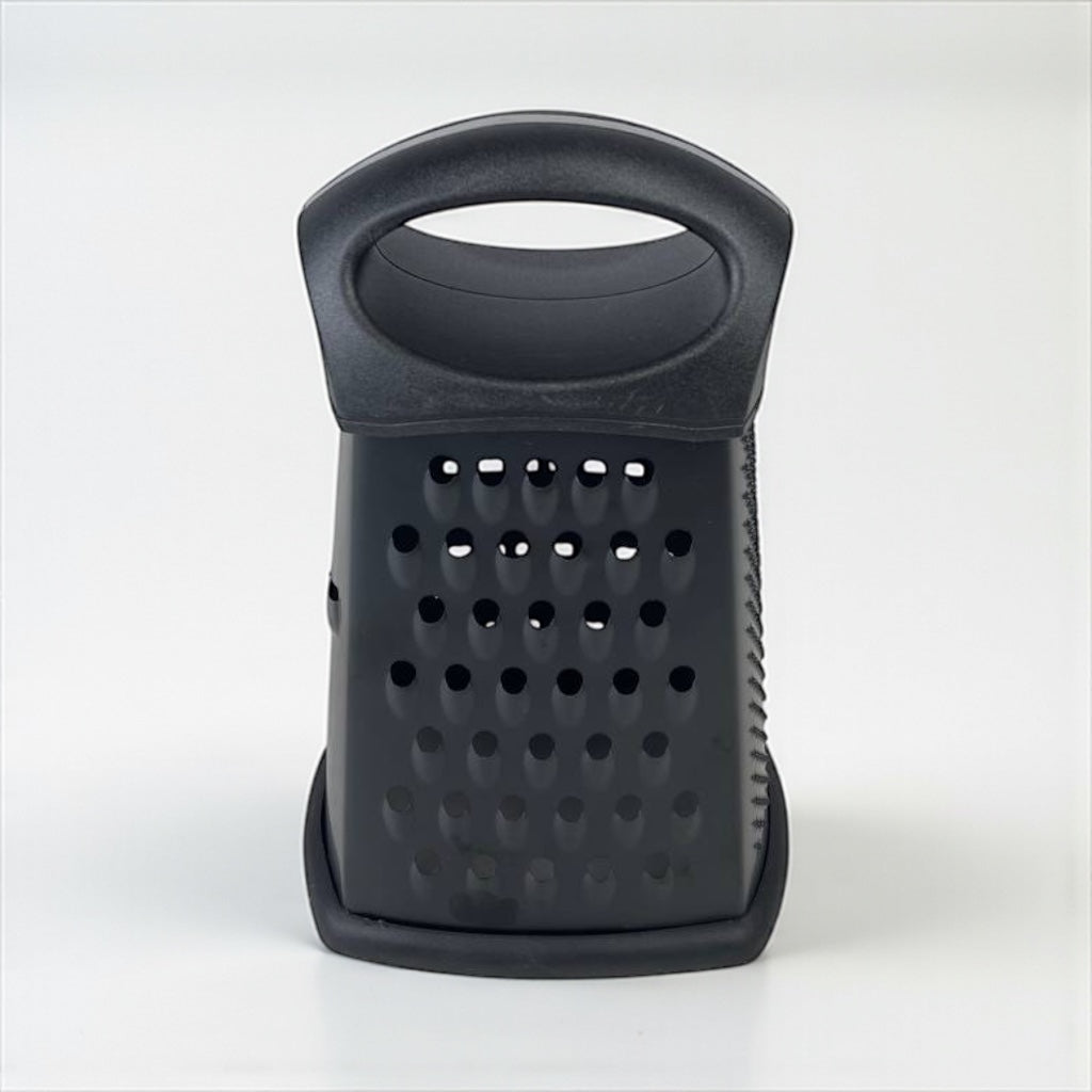 Black kitchen grater on a white background available at cupindy.com