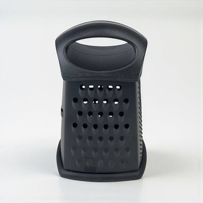 Black kitchen grater on a white background available at cupindy.com