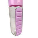 Pink and clear water bottle with measurement markings on a white background