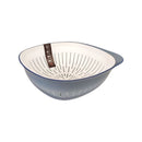 Colander with blue exterior and beige interior on a white background