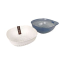 Two plastic bowls, one white and one blue, on a white background