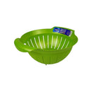 Green colander with a brand label on a white background