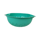 Green colander on a white background