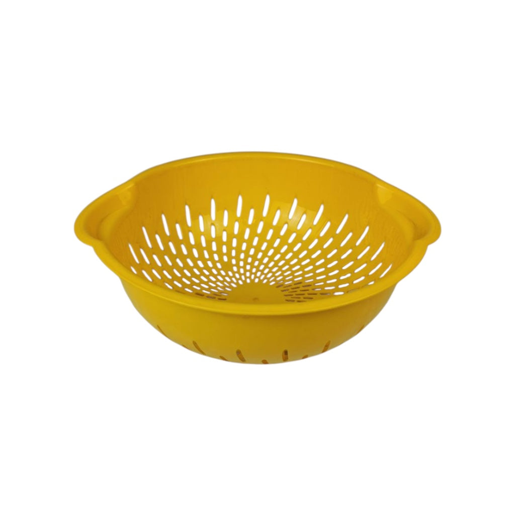 Yellow plastic colander on a white background