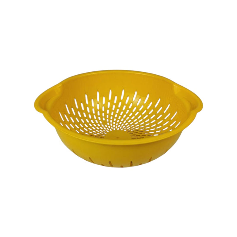 Yellow plastic colander on a white background