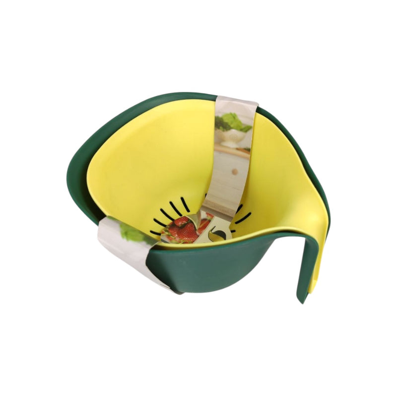 Yellow and green baby seat with cartoon design on a white background