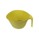Yellow colander on a white background