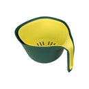 Green and yellow colander on a white background
