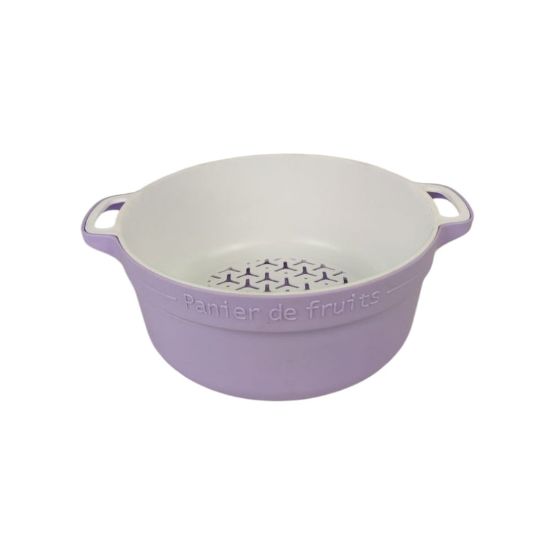 Purple fruit colander with white interior on a white background