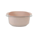Pink container with a lid on a white background