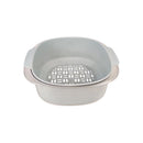Gray kitchen strainer on a white background
