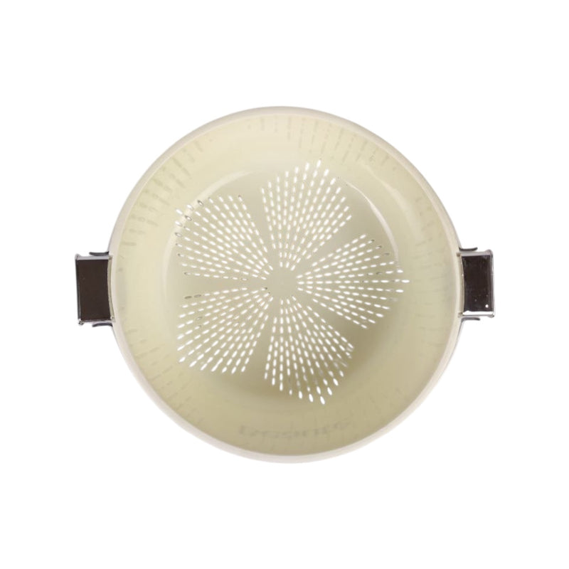 Round white strainer with metal handles on a white background
