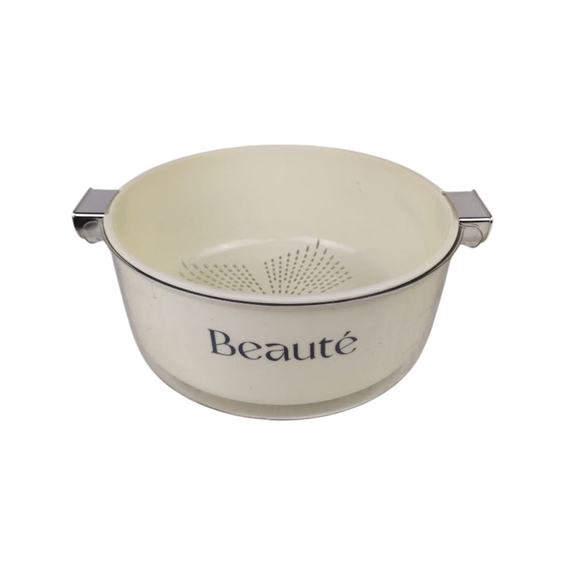 Beige colander with 'Beaçé' branding on a white background