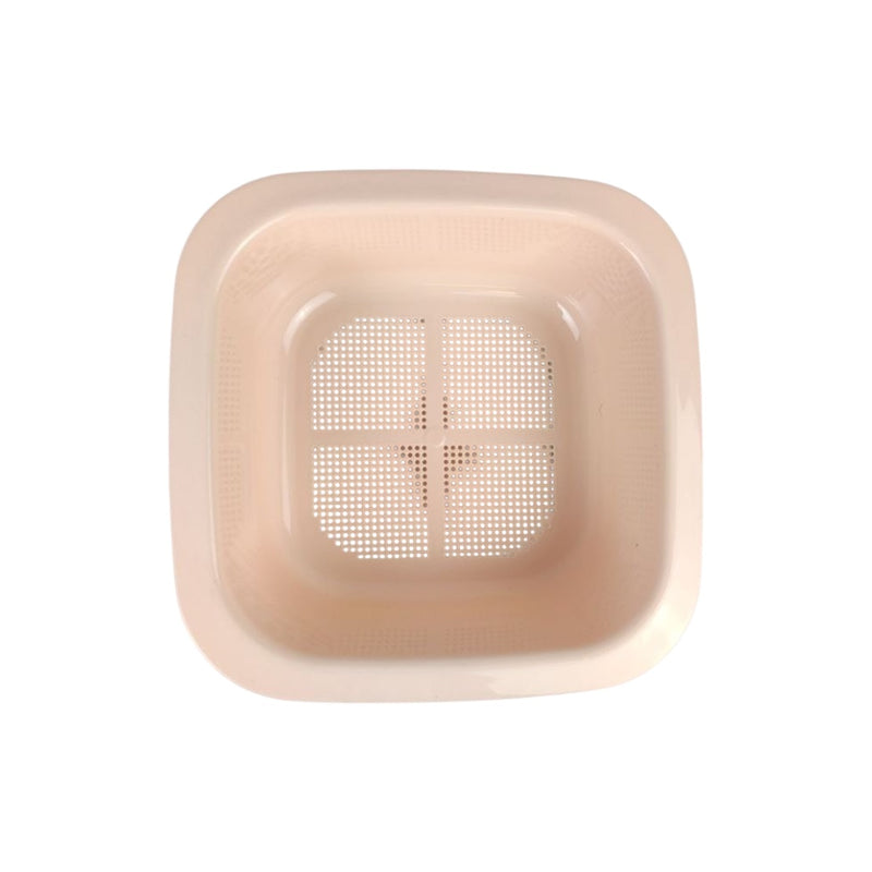 Beige square plastic filter with mesh on a white background