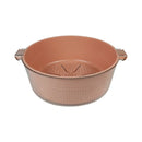Copper-colored colander on a white background